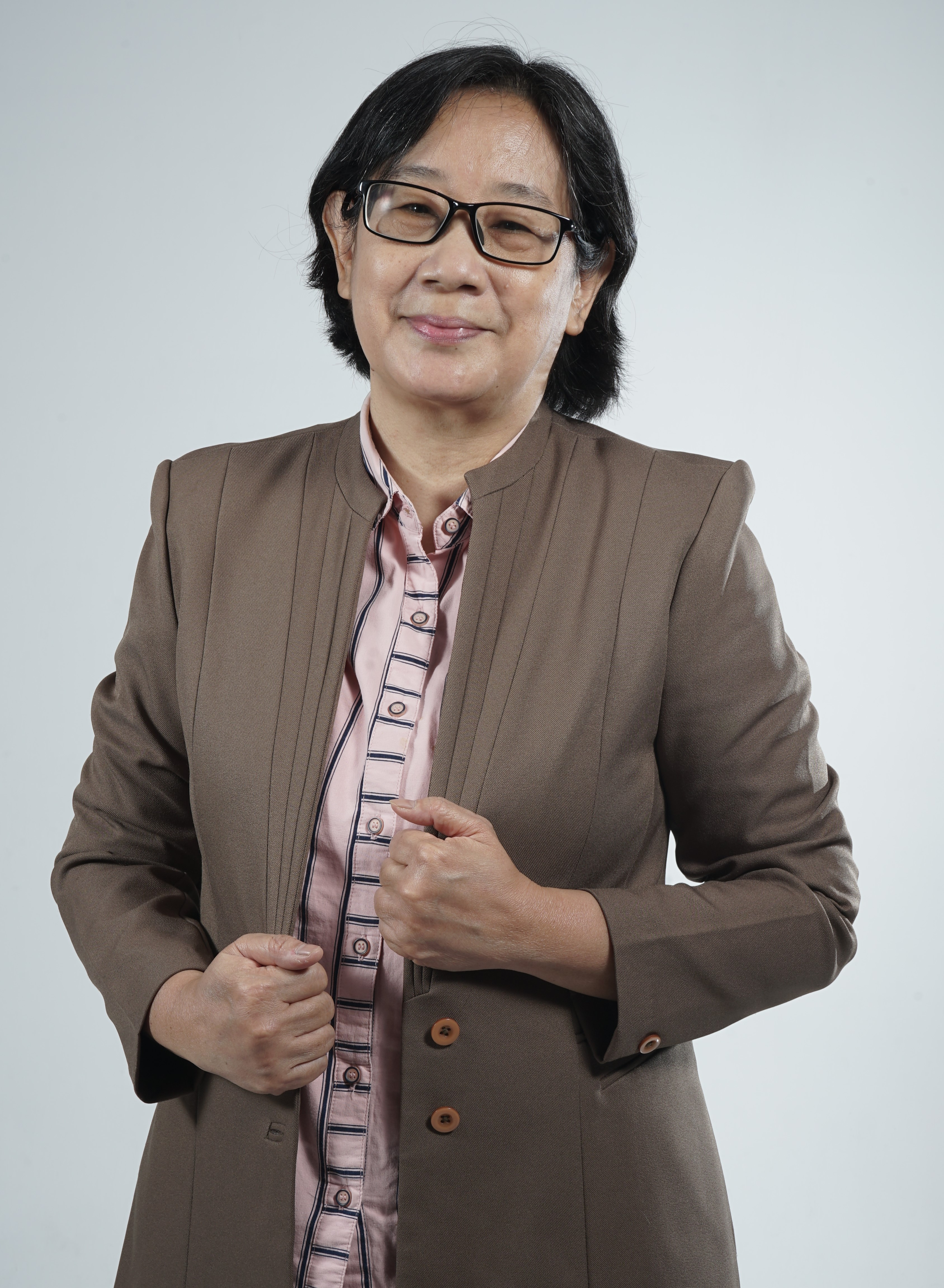 Dr. M.J. Dewiyani Sunarto